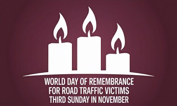 Graphic showing three white lit candles on a burgundy background with the text: "WORLD DAY OF REMEMBRANCE FOR ROAD TRAFFIC VICTIMS THIRD SUNDAY IN NOVEMBER."